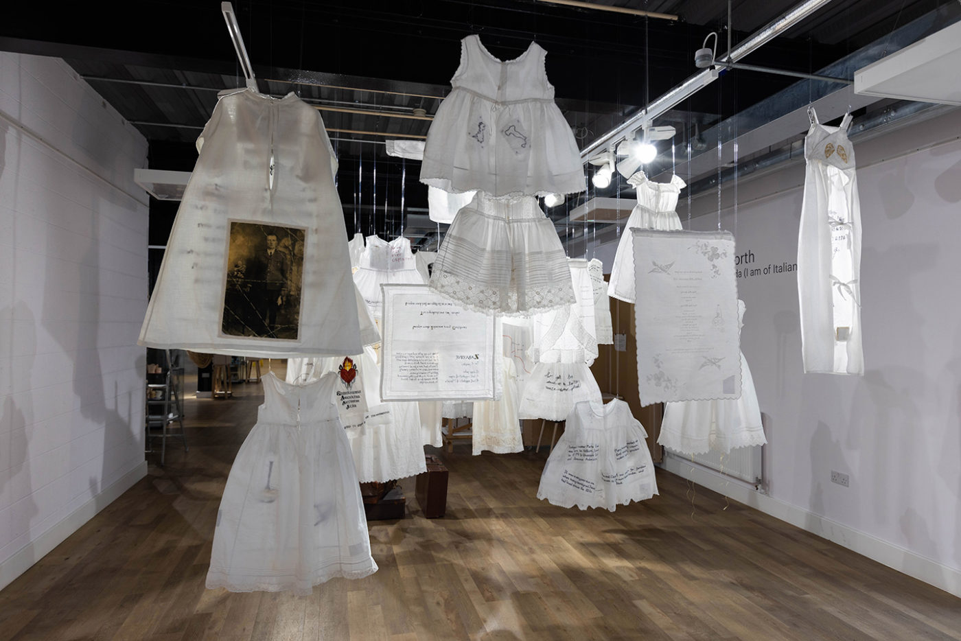 Installation shown from the back, EXILE: sono oriunda (I am of Italian descent) at The Hub, Sleaford, Susan Aldworth, 2023. Photograph by Scott Murray.