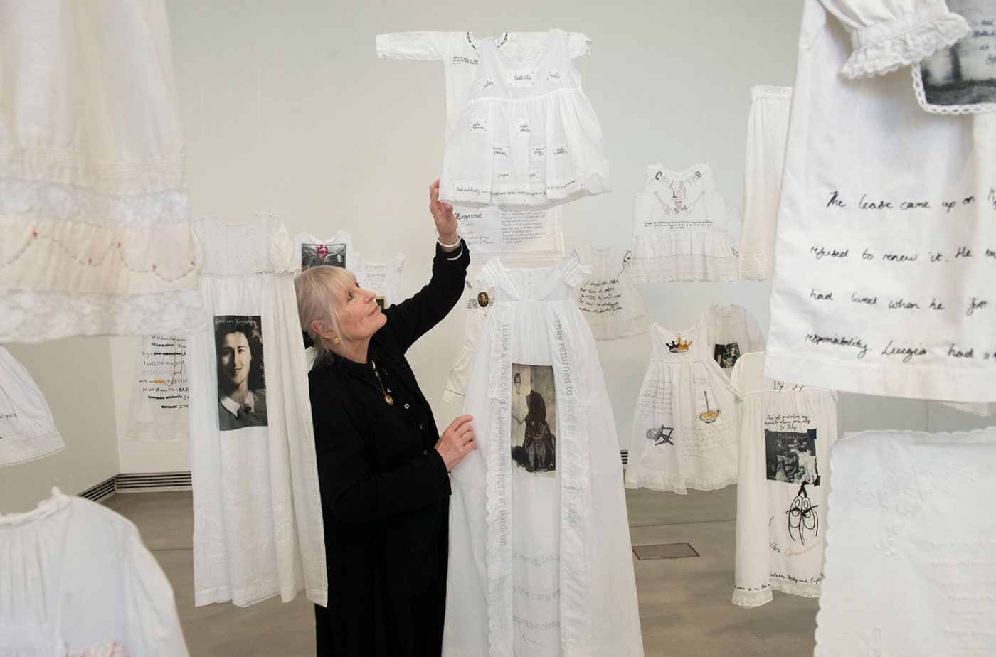 Belongings, Artist with installation at Edinburgh Printmakers, 2026. Photograph by Alan Dimmick